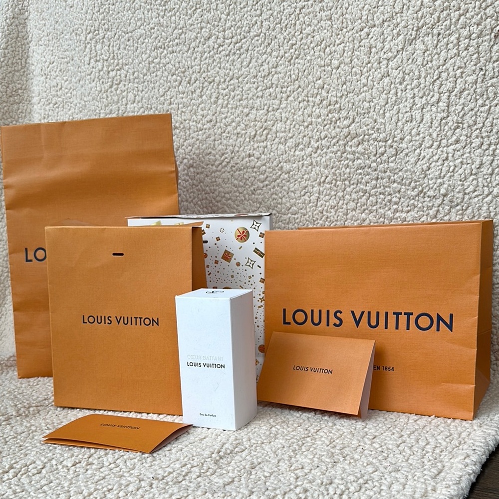 100% authentic Louis Vuitton shopping bags